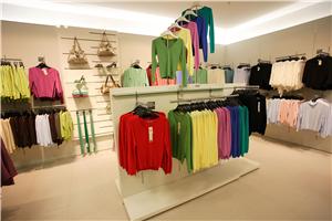 Retailers and fashion designers agree to cut environmental impact of clothing